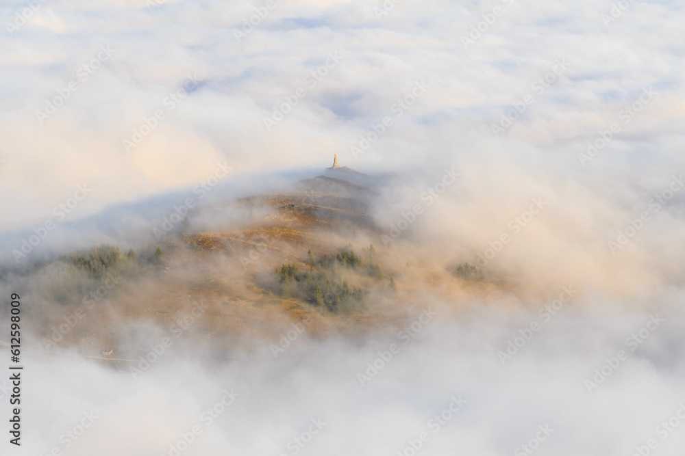Aerial view of the mountains in the fog