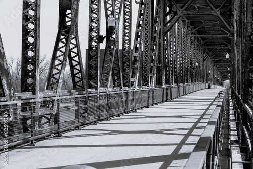Grayscale of the Meridian Bridge under the sunlight in Yankton, South Dakota photo