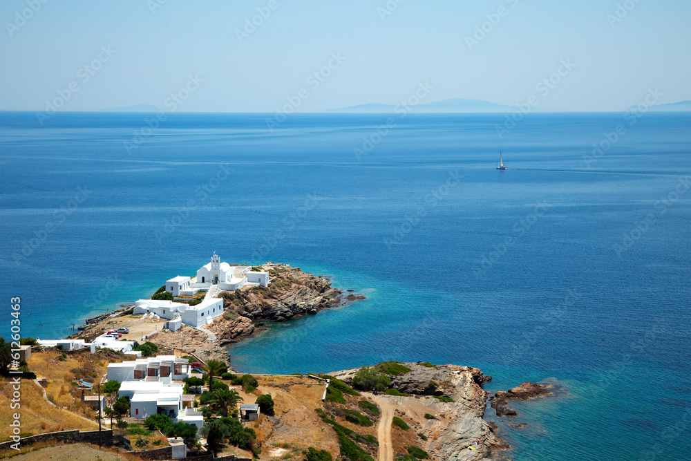 View of medieval monastery of Chrissopigi and coastline  in Sifnos  in Greece