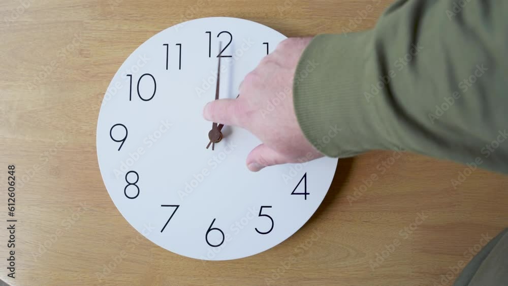 Daylight savings clock with hand moving from standard time change DST CST CDT