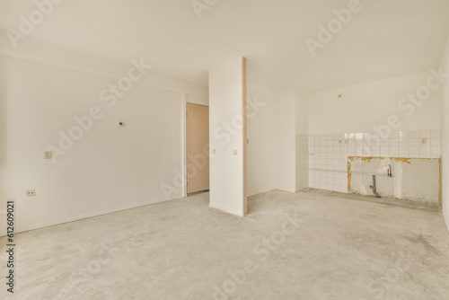 an empty room with white walls and no one wall in the photo is taken out to show how it's done