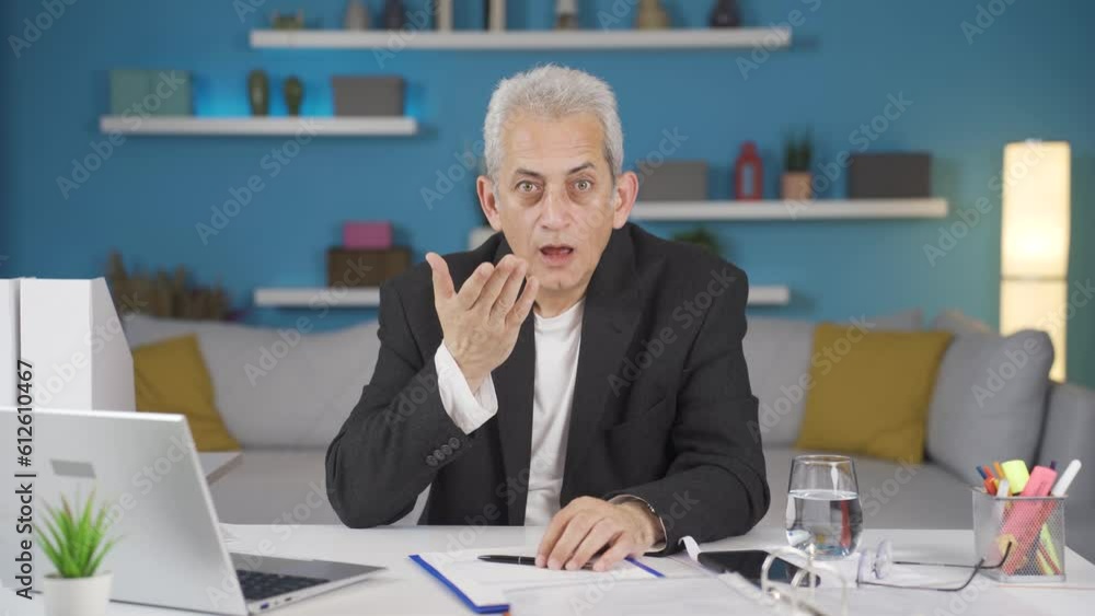 Home office worker man looking at camera confused. Home office worker man looking at camera confused.