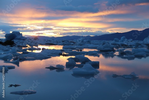 Frozen river with mountains in the background during scenic sunset, Lago Viedma, Argentina photo