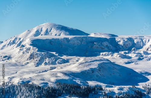 Aerial view of beautiful mountains during winter © Lutzifer Videographer/Wirestock Creators