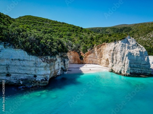 (4K) Drone shot of a little cove next to Fteri Beach, Kefalonia, Cephalonia, Greece photo