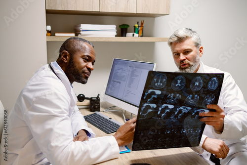 General practitioner tomography scan diagnostic teamwork photo