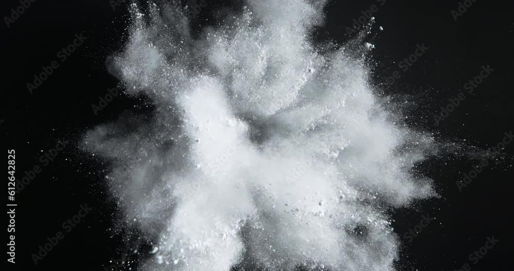 Slow motion of Top view of explosion of white powder dust spreading around