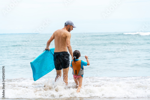 Kid surf playing beach Caribbean holidays  photo
