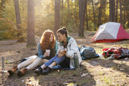 Friend drink campground nature holiday chill conversation