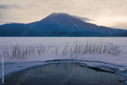 Sunrise in frozen Akan lake photo