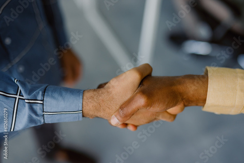 Anonymous partner handshake trust meeting photo