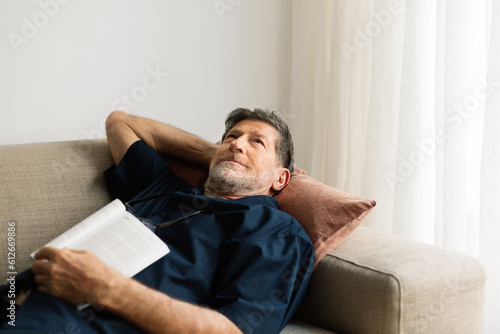 Man Relaxing on Couch at Home