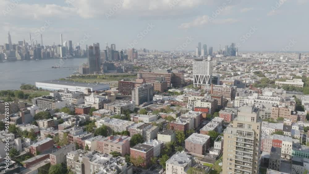 Aerial of Williamsburg's waterfront with Manhattan skyline reveal Aerial of Williamsburg's waterfront with Manhattan skyline reveal