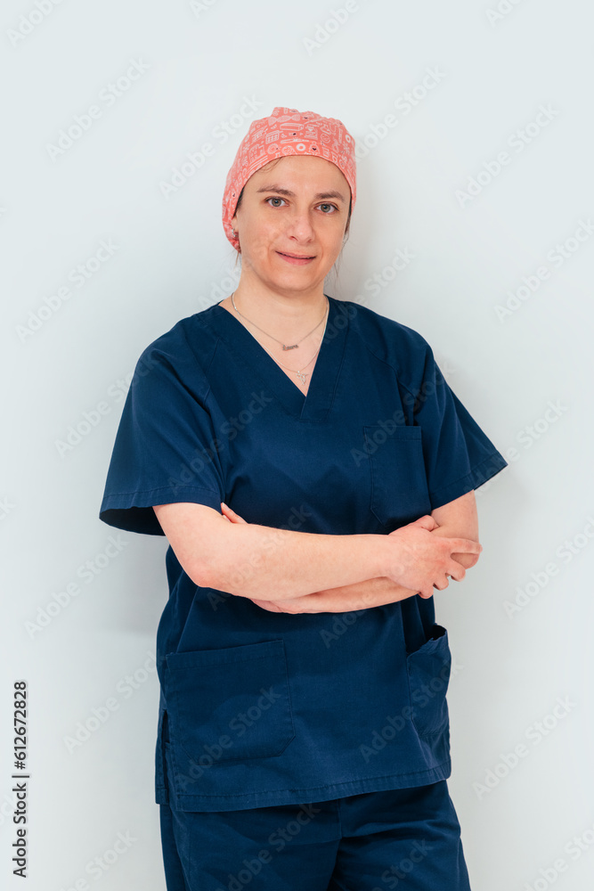 Smiling woman biologist standing with crossed arms Smiling woman biologist standing with crossed arms