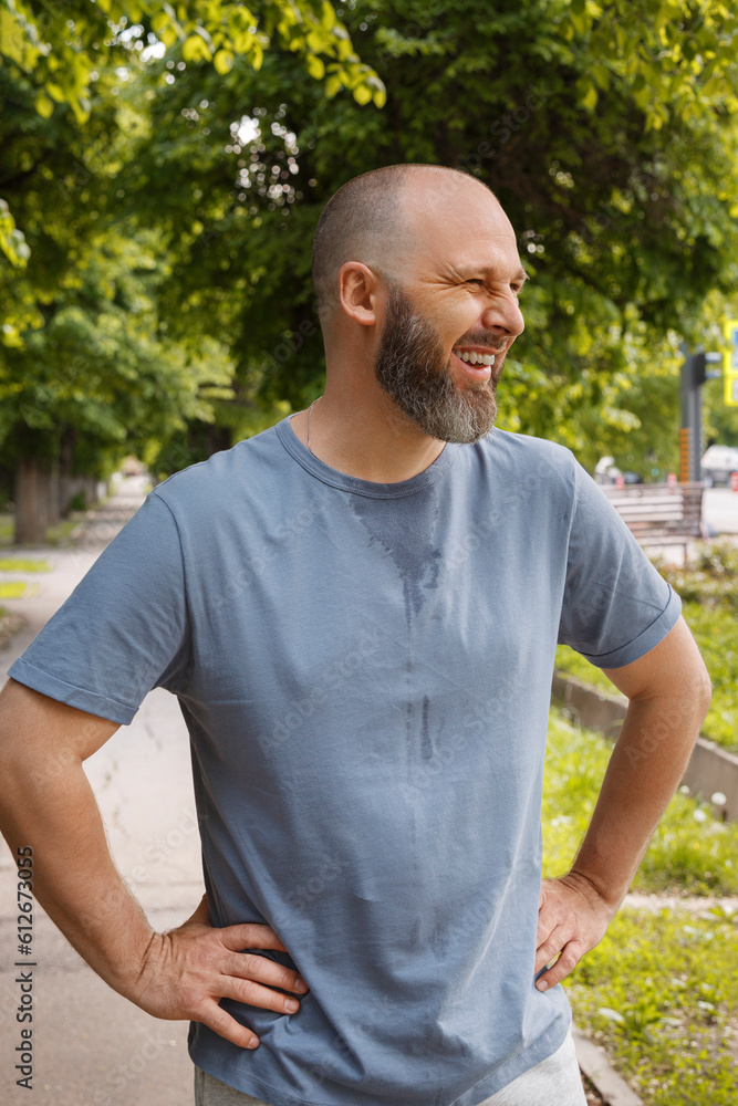 Man laughing during break from training Man laughing during break from training