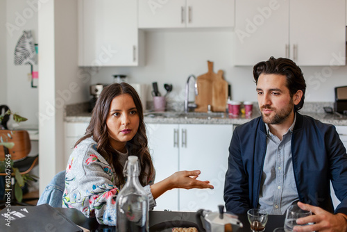 Business couple during brunch at kitchen office photo