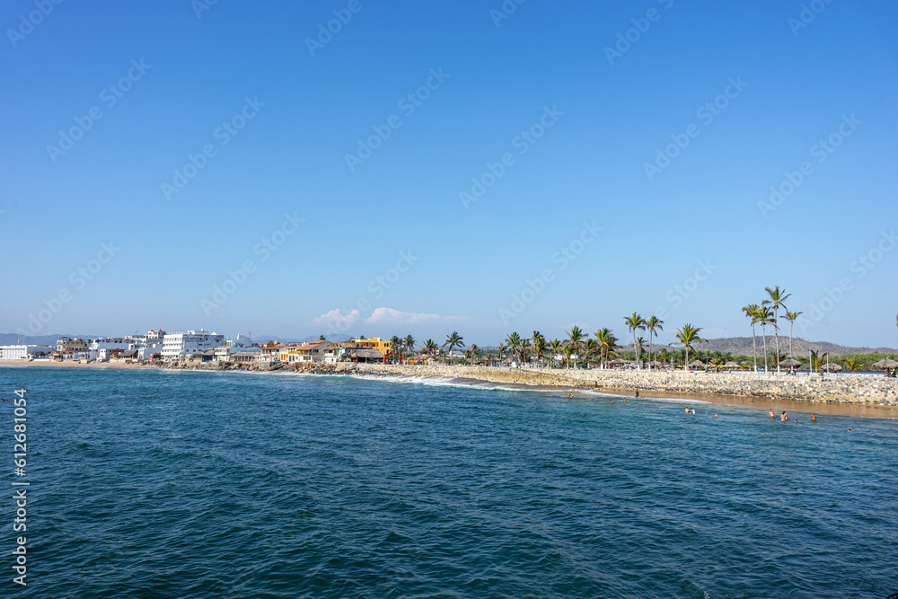 Fototapeta premium Boardwalk of Barra de Navidad beach, cihuatlan, Jalisco, mouth of river, Melaque Beach, Costalegre, cabo of mexico, bay of navidad.