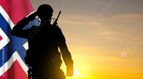 Silhouette of a soldier against the sunset with Norway flag. EPS10 vector