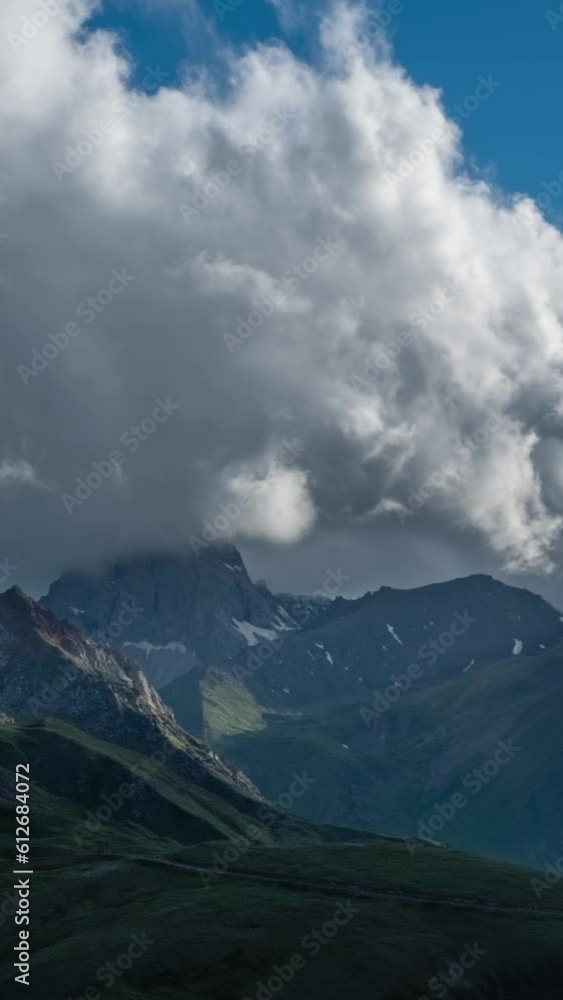 Beautiful landscape with mountains and clouds in dusk, Caucasus, Russia, timelapse. Vertical video Beautiful landscape with mountains and clouds in dusk, Caucasus, Russia, timelapse. Vertical video