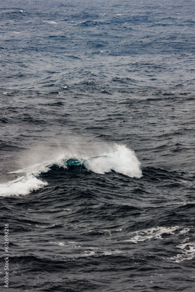 Fototapeta premium Waves ocean spray tides stormy day on Atlantic Ocean during transatlantic crossing on legendary ocean liner