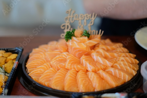 sliced salmon on a plate in dinner time