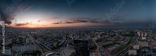 Panoramic drone image of the center of the Polish city of Katowice in the evening. Office buildings and a roundabout in the capital of Upper Silesia