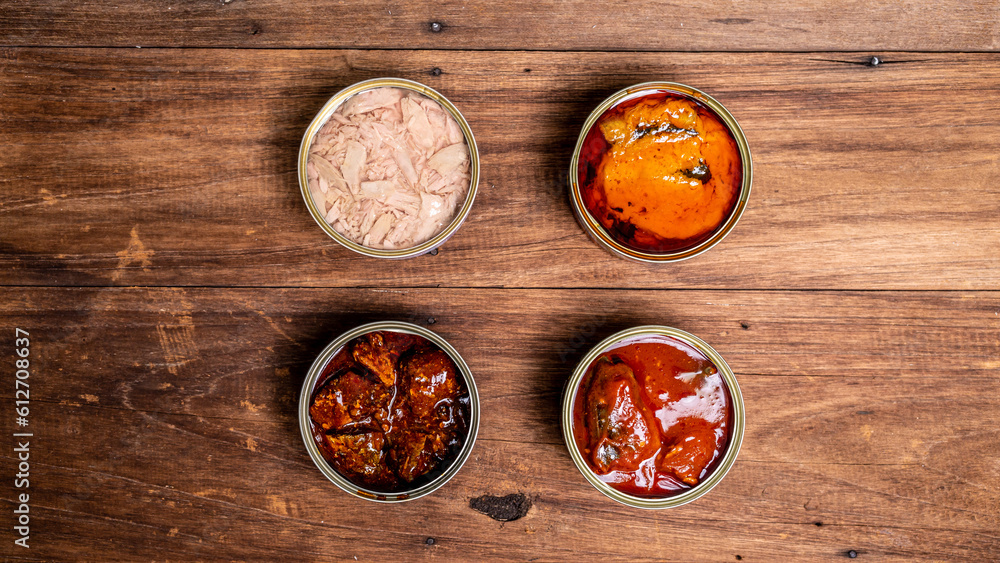 Fototapeta premium Canned food top view photo, Cans with pull-out ring, metal packaging.