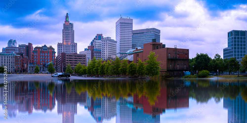 Providence city skyline and buildings under storm clouds and water reflections, Rhode Island