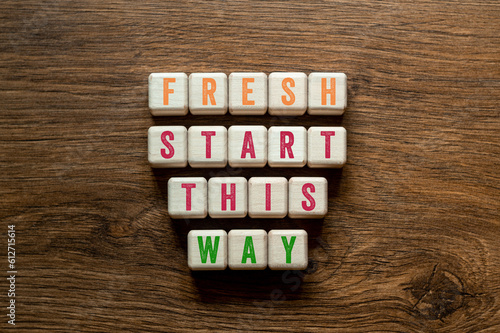Fresh start this way - word concept on building blocks, text