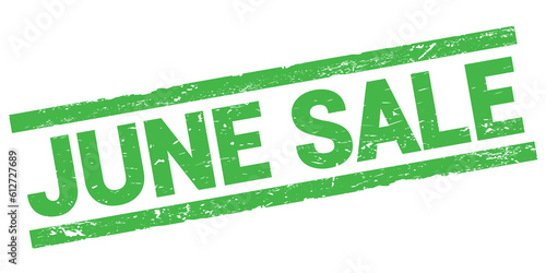 JUNE SALE text on green rectangle stamp sign.