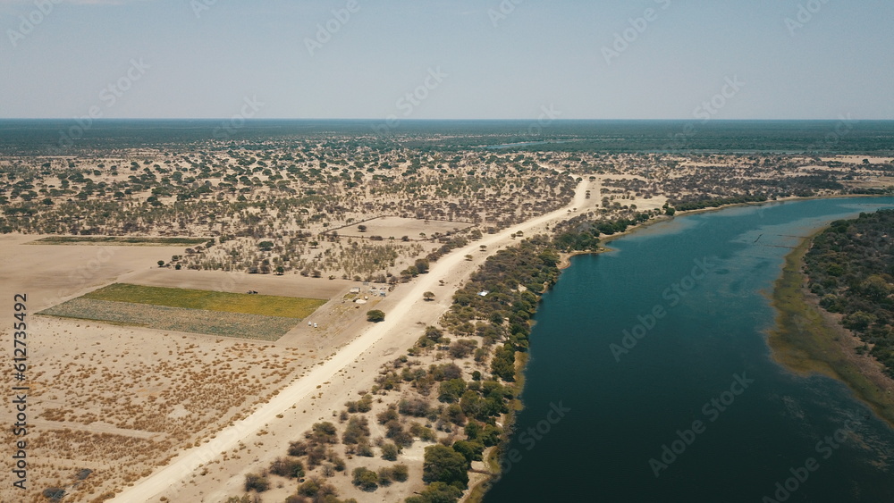Boteti river as it meanders through the village of Makalamabedi, Botswana, Africa