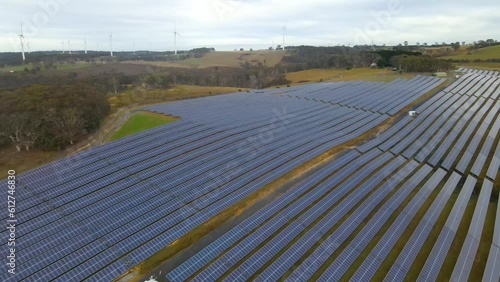 Aerial drone view of the hybrid Gullen Solar Farm and Gullen Range Wind Farm for renewable clean energy supply located at Bannister in the Upper Lachlan Shire, NSW, Australia  photo