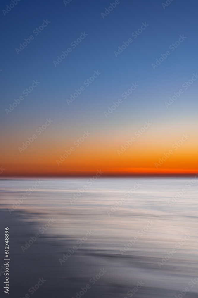 Abstract view of the sunset at the beach on Juist, East Frisian Islands, Germany.