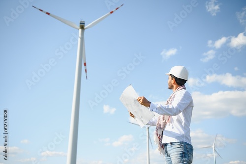 Indian Windmill engineer inspection and progress check wind turbine.