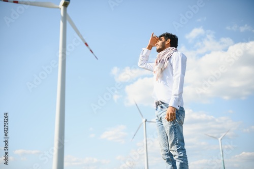 Indian Windmill engineer inspection and progress check wind turbine.