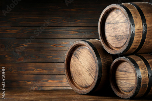 Wooden barrels on table, space for text
