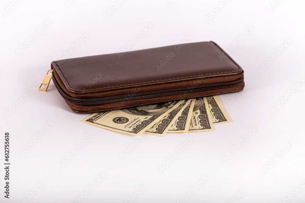 Wallet with money on a white background. A pack of dollars in your wallet. Banknotes one hundred dollars. Employee salary Wallet with money on a white background. A pack of dollars in your wallet. Banknotes one hundred dollars. Employee salary