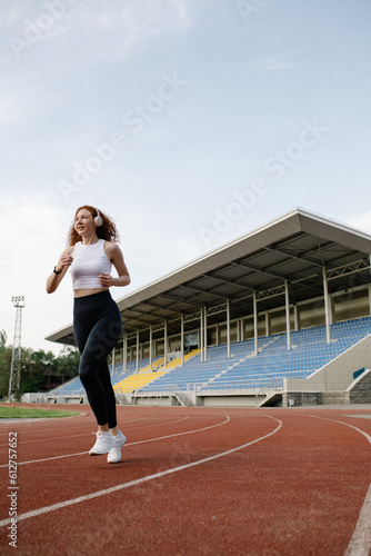 woman running on track © Anastassiya