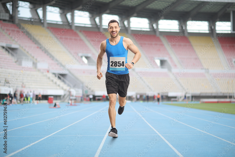 Full length portrait of a man running a race