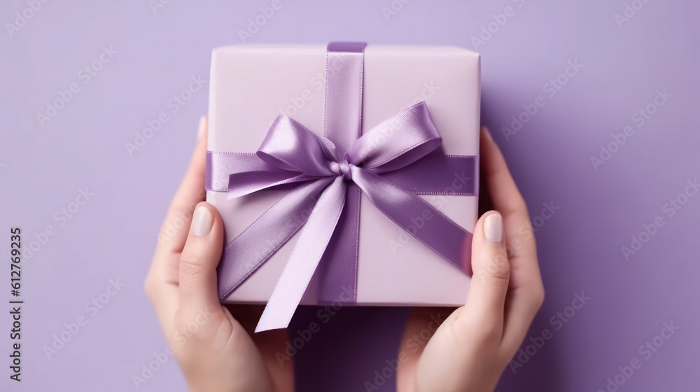 Female hands hold a gift box with a bow. Surprise preparation. Christmas Eve, Xmas and New Year postcard. Black Friday sales, Birthday celebration party concept. Female hands hold a gift box with a bow. Surprise preparation. Christmas Eve, Xmas and New Year postcard. Black Friday sales, Birthday celebration party concept.