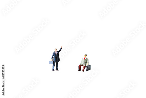 miniature model of businessman isolated on white background.