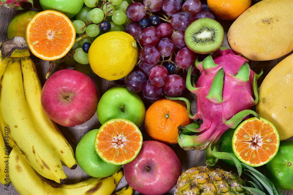 assorted fruits, top view healthy food concept Including high vitamin fruits, fresh fruits, tropical fruits assorted fruits, top view healthy food concept Including high vitamin fruits, fresh fruits, tropical fruits
