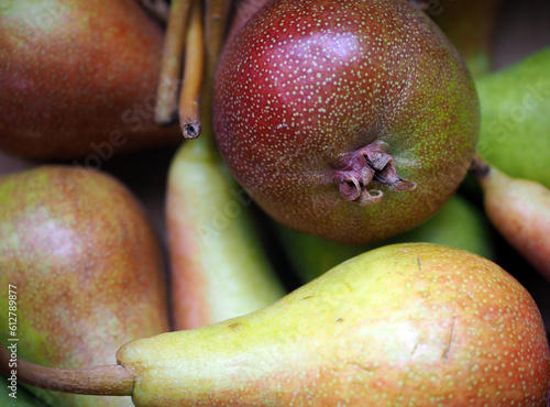 Red ripe pears background. June Beauty Pear. Reddened Pyrus Communis fruits. photo