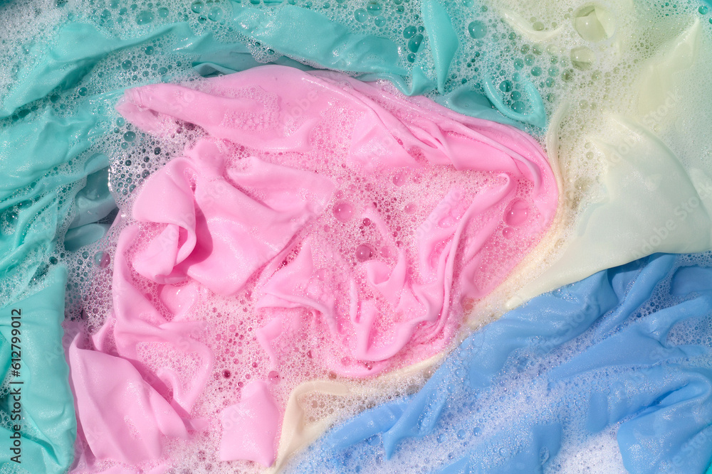 Clothes soak in powder detergent water dissolution, washing colored clothes Clothes soak in powder detergent water dissolution, washing colored clothes
