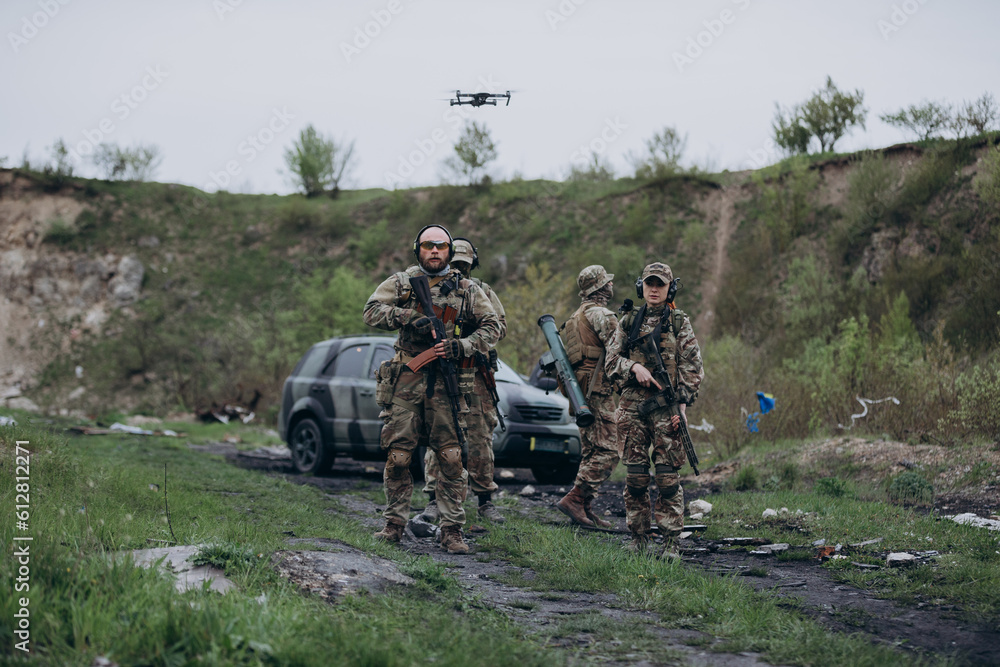 A group of Ukrainian soldiers with a drone A group of Ukrainian soldiers with a drone