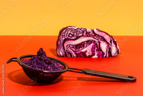 Strainer with pulp of red cabbage after juice extraction photo
