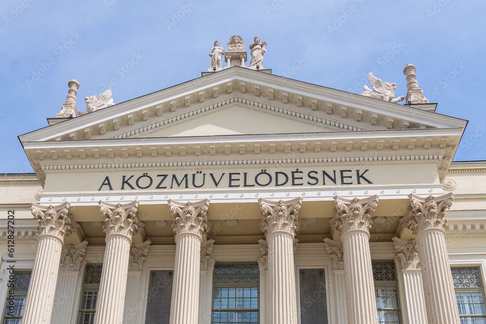 The Móra Ferenc Museum stands proud, a grand architectural column with its majestic classical architecture towering over the city of Szeged.	