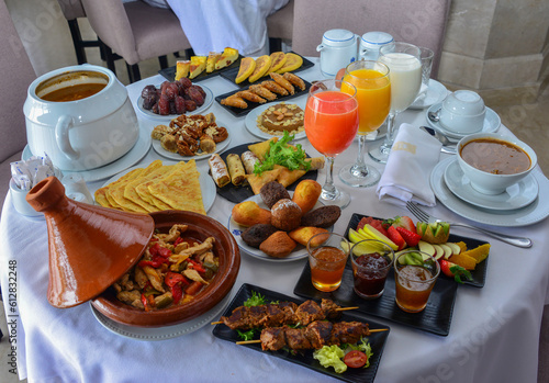 Moroccan breakfast in Ramadan. Harira soup. Dates, tea, juices and various sweets