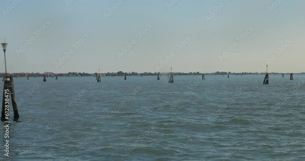 The Bricole is distinctive landscapes details of the Venetian Lagoon that guide boats through it calm waters. The Bricole is distinctive landscapes details of the Venetian Lagoon that guide boats through it calm waters.