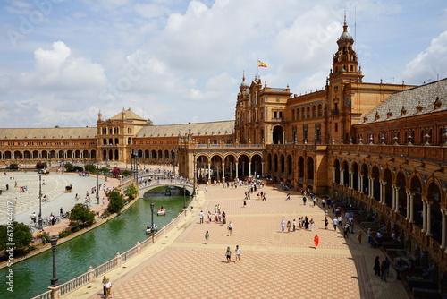 Plaza de España full of tourists in a summer day, Seville, Andalucia, Spain